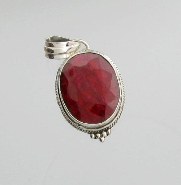 APP: 2k 15.13CT Oval Cut Ruby & Sterling Silver Pendant: 15.13CT Oval Cut Ruby & Sterling Silver Pendant - Appraisal Value: $2.2K