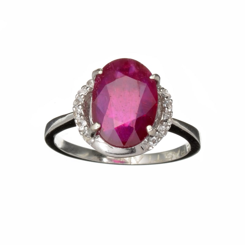 3.57CT Ruby And Colorless Topaz Platinum Over Sterling Silver Ring: Gov. File: K-10972 3.57CT Ruby And Colorless Topaz Platinum Over Sterling Silver Ring Retail Replacement Value:$2.6K Asset Type: Sterling Silver Ring Shipping: $19.95
