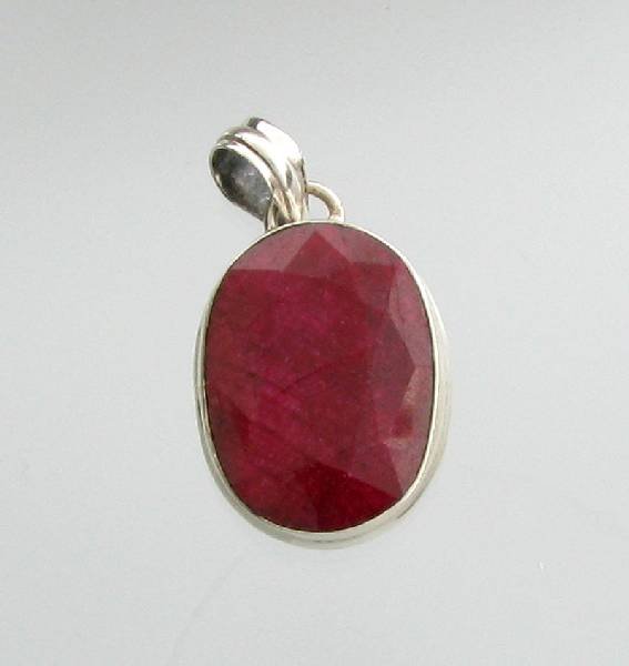 APP: 4k 27.72CT Oval Cut Ruby & Sterling Silver Pendant: 27.72CT Oval Cut Ruby & Sterling Silver Pendant - Appraisal Value: $3.9K