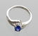 APP: 1k CT Tanzanite & Diamond Plat Sterl Silver Ring