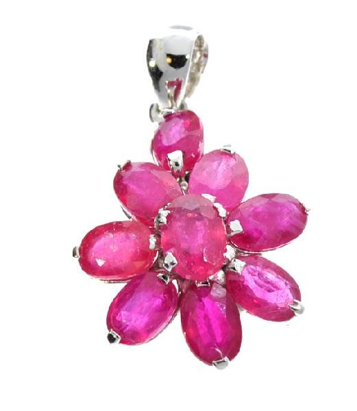 APP: 5k 5.07CT Oval Cut Ruby & Sterling Silver Pendant: 5.07CT Oval Cut Ruby and Sterling Silver Pendant - Appraisal Value: $5.8K