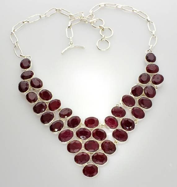 APP: 7k 111 CT Oval Cut Ruby & Sterling Silver Necklace: 111.74CT Oval Cut Ruby and Sterling Silver Necklace - Appraisal Value: $7.5K