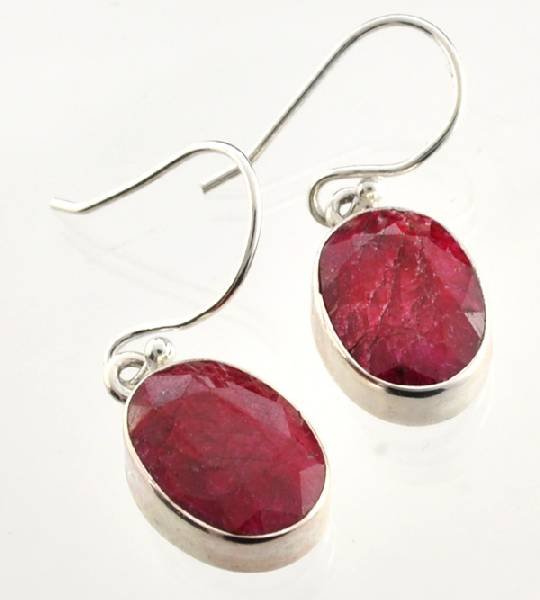 APP: 2k 12 CT Oval Cut Ruby & Sterling Silver Earrings: 12.79CT Oval Cut Ruby and Sterling Silver Earrings - Appraisal Value: $2.5K