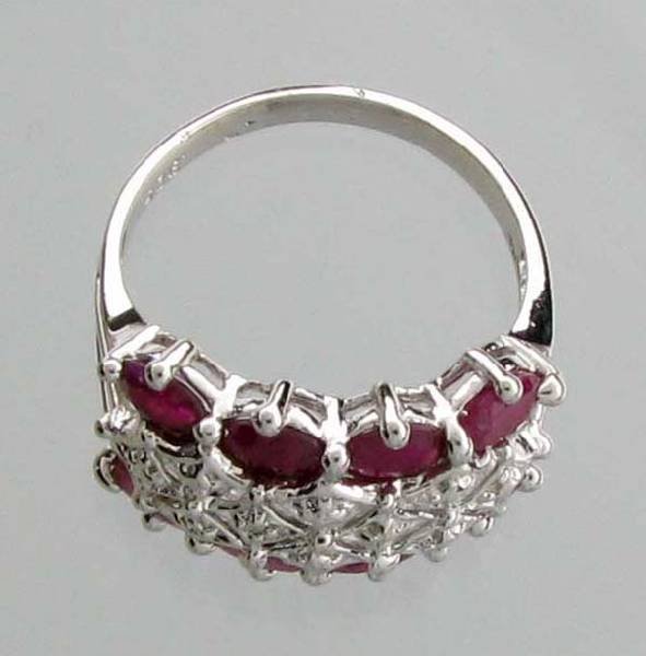 APP: 2.3k 1.44CT Oval Cut Ruby & Sterling Silver Ring: 1.44CT Oval Cut Ruby and Sterling Silver Ring - Appraisal Value: $2.3K