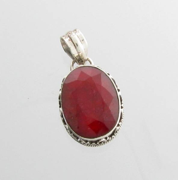 APP: 3k 18 CT Oval Cut Ruby & Sterling Silver Pendant: 18.70CT Oval Cut Ruby & Sterling Silver Pendant - Appraisal Value: $3.7K