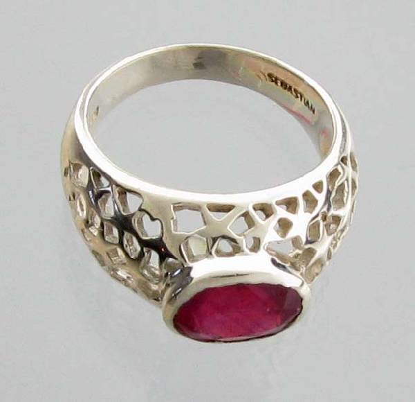 APP: 2k Sebastian 2CT Oval Cut Ruby & Silver Ring: Designer Sebastian 2.63CT Oval Cut Ruby and Sterling Silver Ring - Appraisal Value: $2.4K