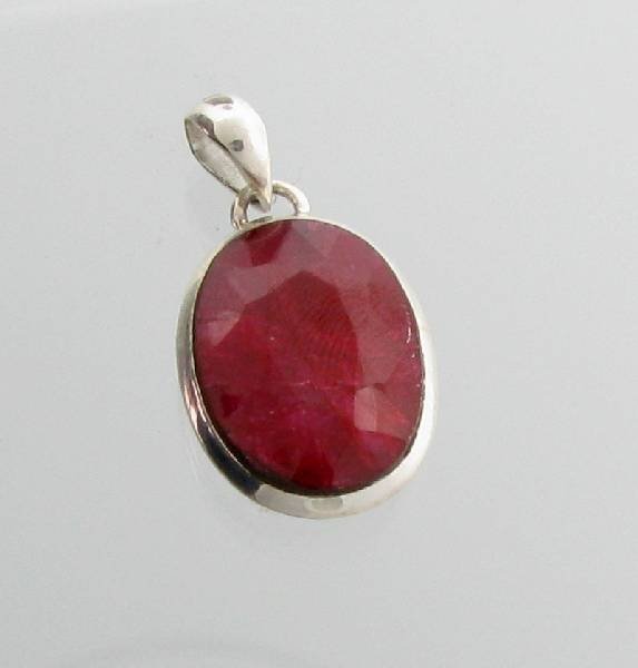 APP: 2k 15.77CT Oval Cut Ruby & Sterling Silver Pendant: 15.77CT Oval Cut Ruby & Sterling Silver Pendant - Appraisal Value: $2.2K