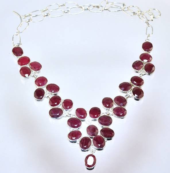 APP: 6k 93 CT Oval Cut Ruby & Sterling Silver Necklace: 93.81CT Oval Cut Ruby and Sterling Silver Necklace - Appraisal Value: $6.3K