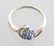 APP: 1k CT Tanzanite & Diamond Plat Sterl Silver Ring