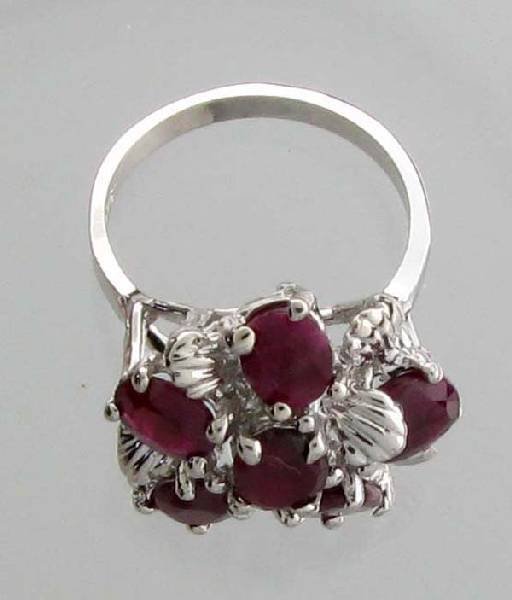APP: 4.2k 4.10CT Oval Cut Ruby & Sterling Silver Ring: 4.10CT Oval Cut Ruby and Sterling Silver Ring - Appraisal Value: $4.1K