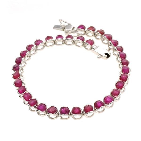 APP: 11k 7 CT Round Cut Ruby & Sterling Silver Bracelet: 7.26CT Round Cut Ruby and Sterling Silver Bracelet - Appraisal Value: $11.3K