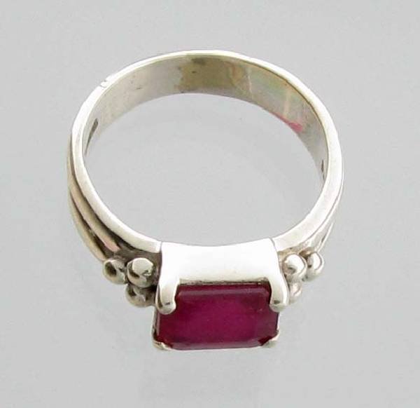 APP: 3k Sebastian 3CT Emerald Cut Ruby & Silver Ring: Designer Sebastian 3.32CT Emerald Cut Ruby and Sterling Silver Ring - Appraisal Value: $3.5K </