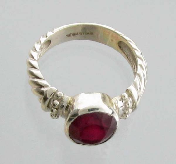 APP: 4k Sebastian 4CT Oval Cut Ruby & Silver Ring: Designer Sebastian 4.94CT Oval Cut Ruby and Sterling Silver Ring - Appraisal Value: $4.2K