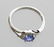 APP: 1k CT Tanzanite & Diamond Plat Sterl Silver Ring