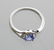 APP: 1k CT Tanzanite & Diamond Plat Sterl Silver Ring