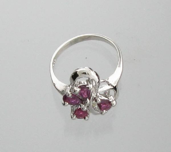 APP: 1.5k 0.66CT Pear Cut Ruby & Sterling Silver Ring: 0.66CT Pear Cut Ruby and Sterling Silver Ring - Appraisal Value: $1.5K