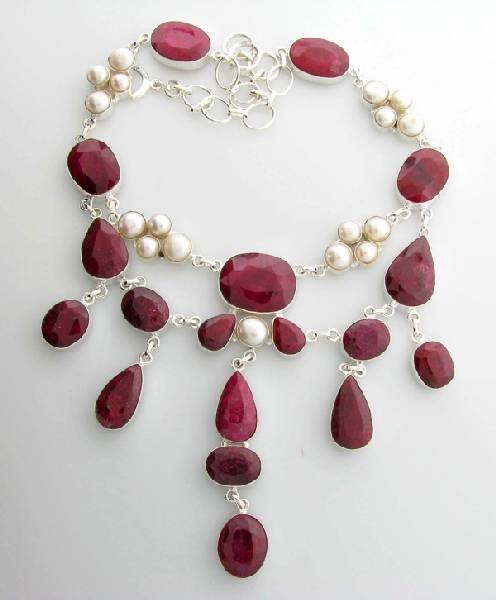 APP: 20k 257.16CT Ruby & Pearl Sterling Silver Necklace: 257.16CT Ruby and Pearl Sterling Silver Necklace - Appraisal Value: $20.6K