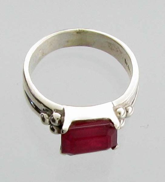 APP: 5k Sebastian 3CT Emerald Cut Ruby & Silver Ring: Designer Sebastian 3.98CT Emerald Cut Ruby and Sterling Silver Ring - Appraisal Value: $5.4K </