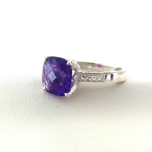 APP: 0k 18kt Gold, 4CT Amethyst w/Diamond & Silver Ring: 18 kt. Gold, 4.17CT Amethyst w/Diamond & Platinum Overlay Sterling Silver Ring - Appraisal Value: $0.9K