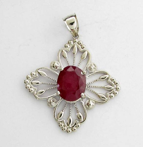 APP: 13k 8.93CT Oval Cut Ruby & Sterling Silver Pendant: 8.93CT Oval Cut Ruby and Sterling Silver Pendant - Appraisal Value: $13.7K