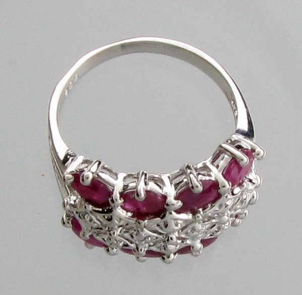 APP: 2.3k 1.41CT Oval Cut Ruby & Sterling Silver Ring: 1.41CT Oval Cut Ruby and Sterling Silver Ring - Appraisal Value: $2.2K