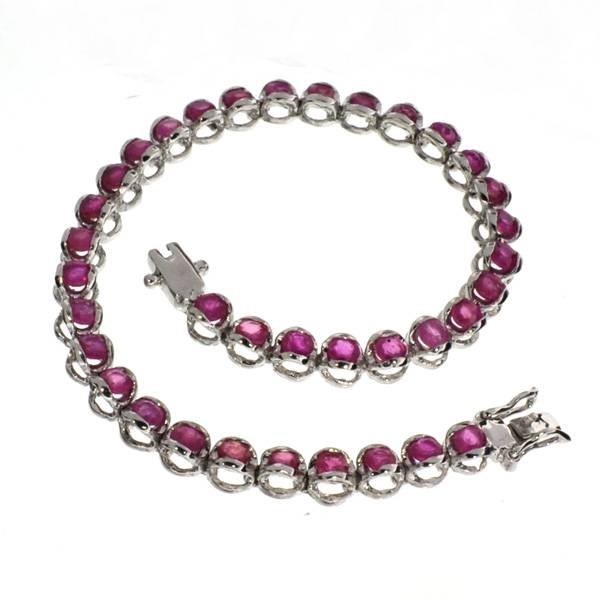 APP: 11k 5CT Round Cut Ruby Sterl Silver Bracelet: 5.12CT Round Cut Ruby Platinum Over Sterling Silver Bracelet - Appraisal Value: $11.6K