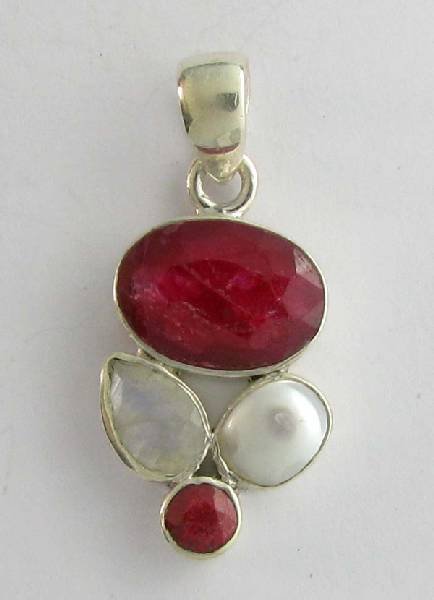 APP: 10k 4CT Ruby Labradorite & Pearl Silver Pendant: 4.37CT Oval Cut Ruby Labradorite and Pearl Sterling Silver Pendant - Appraisal Value: $10.2K