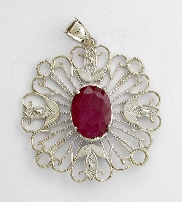 APP: 8k 7.68CT Oval Cut Ruby & Sterling Silver Pendant: 7.68CT Oval Cut Ruby and Sterling Silver Pendant - Appraisal Value: $8.0K