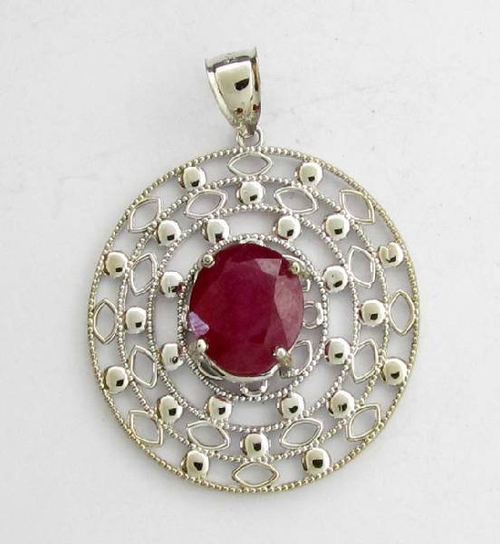 APP: 11k 8.19CT Oval Cut Ruby & Sterling Silver Pendant: 8.19CT Oval Cut Ruby and Sterling Silver Pendant - Appraisal Value: $11.0K