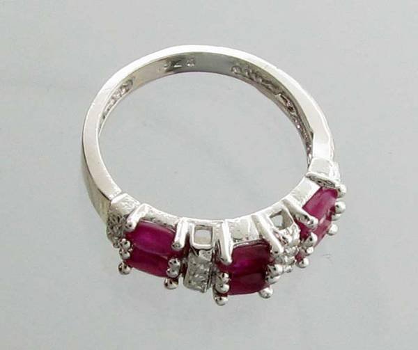 APP: 1.4k 1.20CT Oval Cut Ruby & Sterling Silver Ring: 1.20CT Oval Cut Ruby and Sterling Silver Ring - Appraisal Value: $1.4K