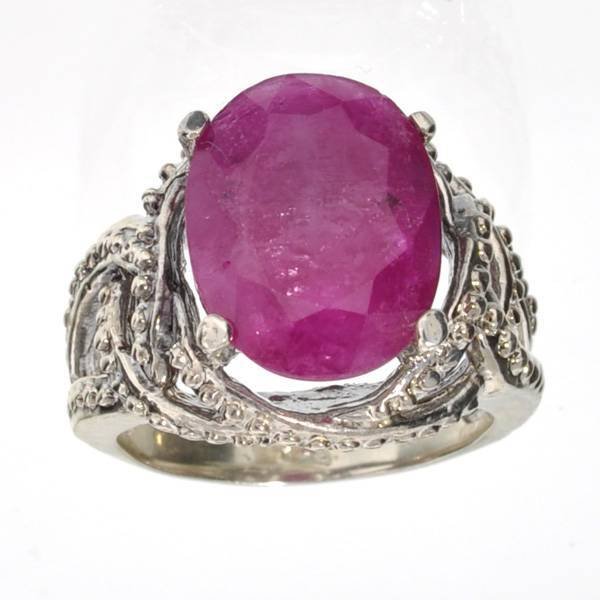 APP: 6k 6CT Oval Cut Ruby & Sterl Silver Ring: 6.06CT Oval Cut Ruby and Platinum Over Sterling Silver Ring - Appraisal Value: $6.1K