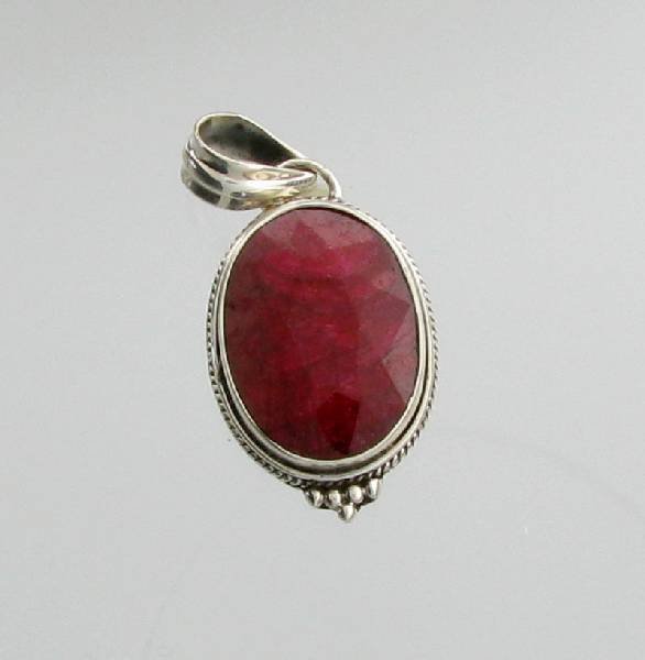APP: 2k 16.64CT Oval Cut Ruby & Sterling Silver Pendant: 16.64CT Oval Cut Ruby & Sterling Silver Pendant - Appraisal Value: $2.4K