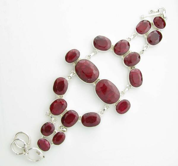 APP: 10k 146CT Oval Cut Ruby & Sterl Silver Bracelet: 146.14CT Oval Cut Ruby and Sterling Silver Bracelet - Appraisal Value: $10.5K <