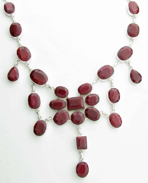 APP: 18k 264CT Mixed Cut Ruby & Sterl Silver Necklace: 264.97CT Mixed Cut Ruby and Sterling Silver Necklace - Appraisal Value: $18.9K