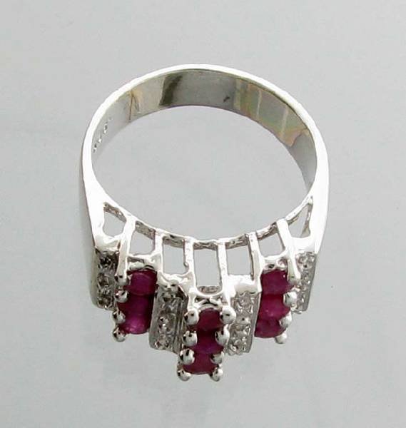 APP: 1.3k 1.03CT Round Cut Ruby & Sterling Silver Ring: 1.03CT Round Cut Ruby and Sterling Silver Ring - Appraisal Value: $1.3K