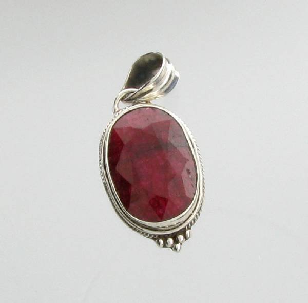 APP: 1k 11.82CT Oval Cut Ruby & Sterling Silver Pendant: 11.82CT Oval Cut Ruby & Sterling Silver Pendant - Appraisal Value: $1.8K