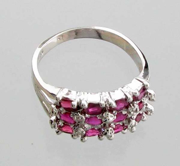 APP: 2.7k 1.26CT Oval Cut Ruby & Sterling Silver Ring: 1.26CT Oval Cut Ruby and Sterling Silver Ring - Appraisal Value: $2.6K