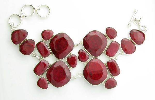 APP: 12k 173CT Mixed Cut Ruby & Sterl Silver Bracelet: 173.90CT Mixed Cut Ruby and Sterling Silver Bracelet - Appraisal Value: $12.6K