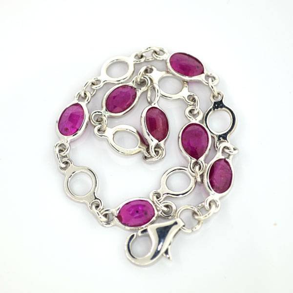 APP: 5k 3CT Oval Cut Ruby Sterl Silver Bracelet: 3.45CT Oval Cut Ruby Platinum Over Sterling Silver Bracelet - Appraisal Value: $5.7K