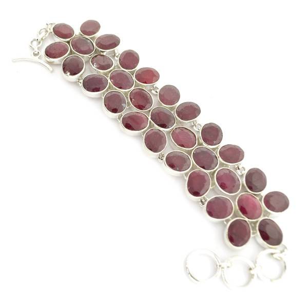 APP: 10k 113CT Oval Cut Ruby & Sterl Silver Bracelet: 113.31CT Oval Cut Ruby and Sterling Silver Bracelet - Appraisal Value: $10.0K <