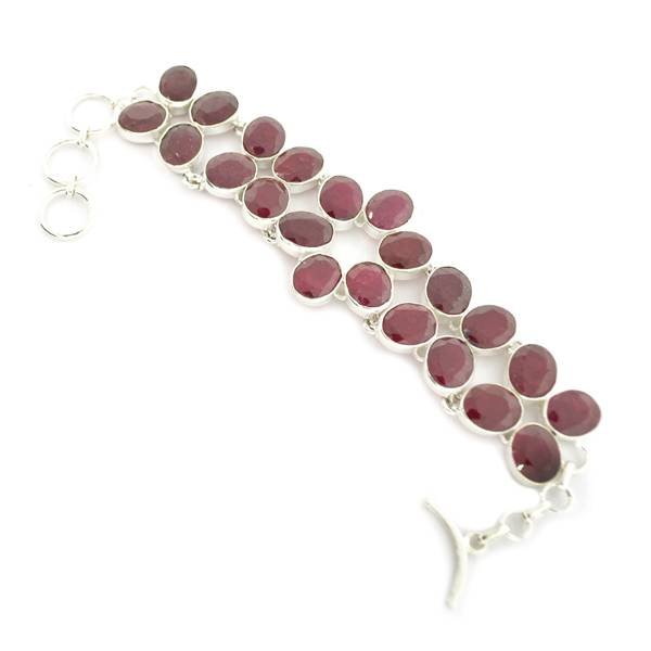 APP: 8k 72 CT Oval Cut Ruby & Sterling Silver Bracelet: 72.50CT Oval Cut Ruby and Sterling Silver Bracelet - Appraisal Value: $8.5K