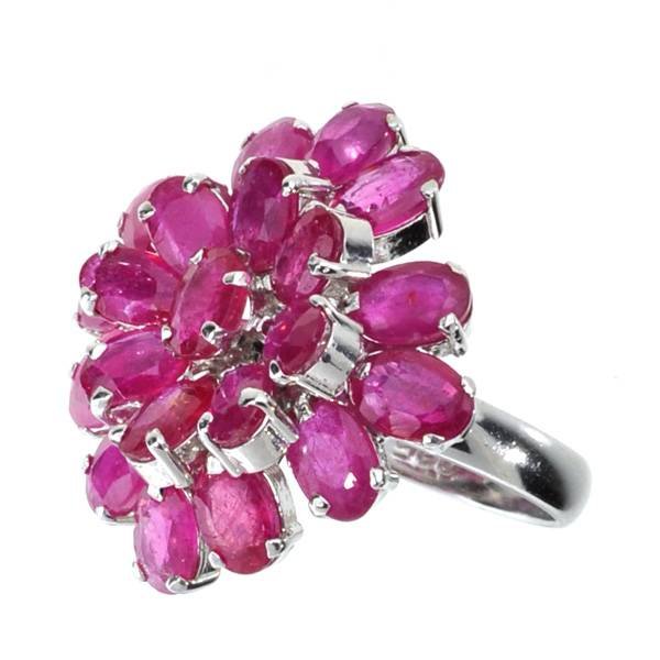 APP: 12k 10CT Oval Cut Ruby & Sterl Silver Ring: 10.44CT Oval Cut Ruby and Platinum Over Sterling Silver Ring - Appraisal Value: $11.9K
