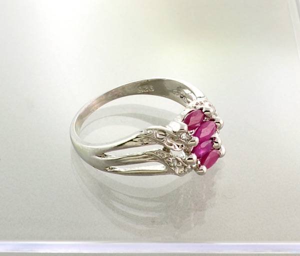 APP: 0.9k 0.59CT Ruby & Sterling Silver Ring: 0.59CT Ruby and Sterling Silver Ring - Appraisal Value: $0.8K