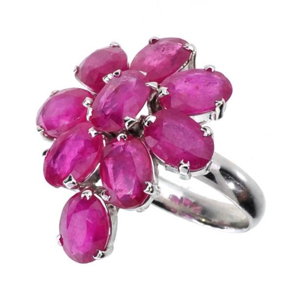 APP: 11k 10CT Oval Cut Ruby & Sterl Silver Ring: 10.83CT Oval Cut Ruby and Platinum Over Sterling Silver Ring - Appraisal Value: $11.6K
