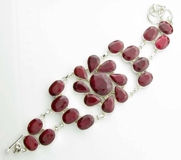 APP: 13k 173CT Mixed Cut Ruby & Sterl Silver Bracelet: 173.43CT Mixed Cut Ruby and Sterling Silver Bracelet - Appraisal Value: $13.7K
