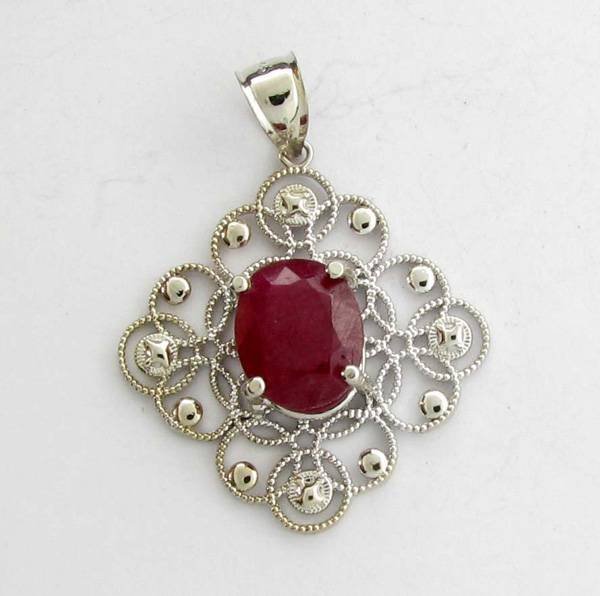 APP: 10k 7.66CT Oval Cut Ruby & Sterling Silver Pendant: 7.66CT Oval Cut Ruby and Sterling Silver Pendant - Appraisal Value: $10.2K