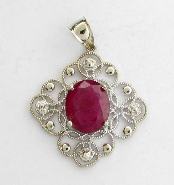 APP: 8k 8.46CT Oval Cut Ruby & Sterling Silver Pendant: 8.46CT Oval Cut Ruby and Sterling Silver Pendant - Appraisal Value: $8.7K