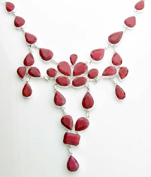 APP: 15k 210CT Mixed Cut Ruby & Sterl Silver Necklace: 210.69CT Mixed Cut Ruby and Sterling Silver Necklace - Appraisal Value: $15.3K