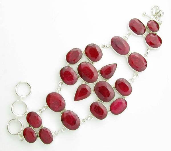 APP: 10k 144CT Mixed Cut Ruby & Sterl Silver Bracelet: 144.90CT Mixed Cut Ruby and Sterling Silver Bracelet - Appraisal Value: $10.6K