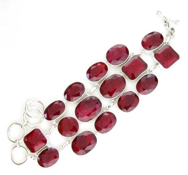 APP: 12k 146CT Mixed Cut Ruby & Sterl Silver Bracelet: 146.86CT Mixed Cut Ruby and Sterling Silver Bracelet - Appraisal Value: $12.4K